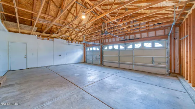 a view of a room with wooden walls