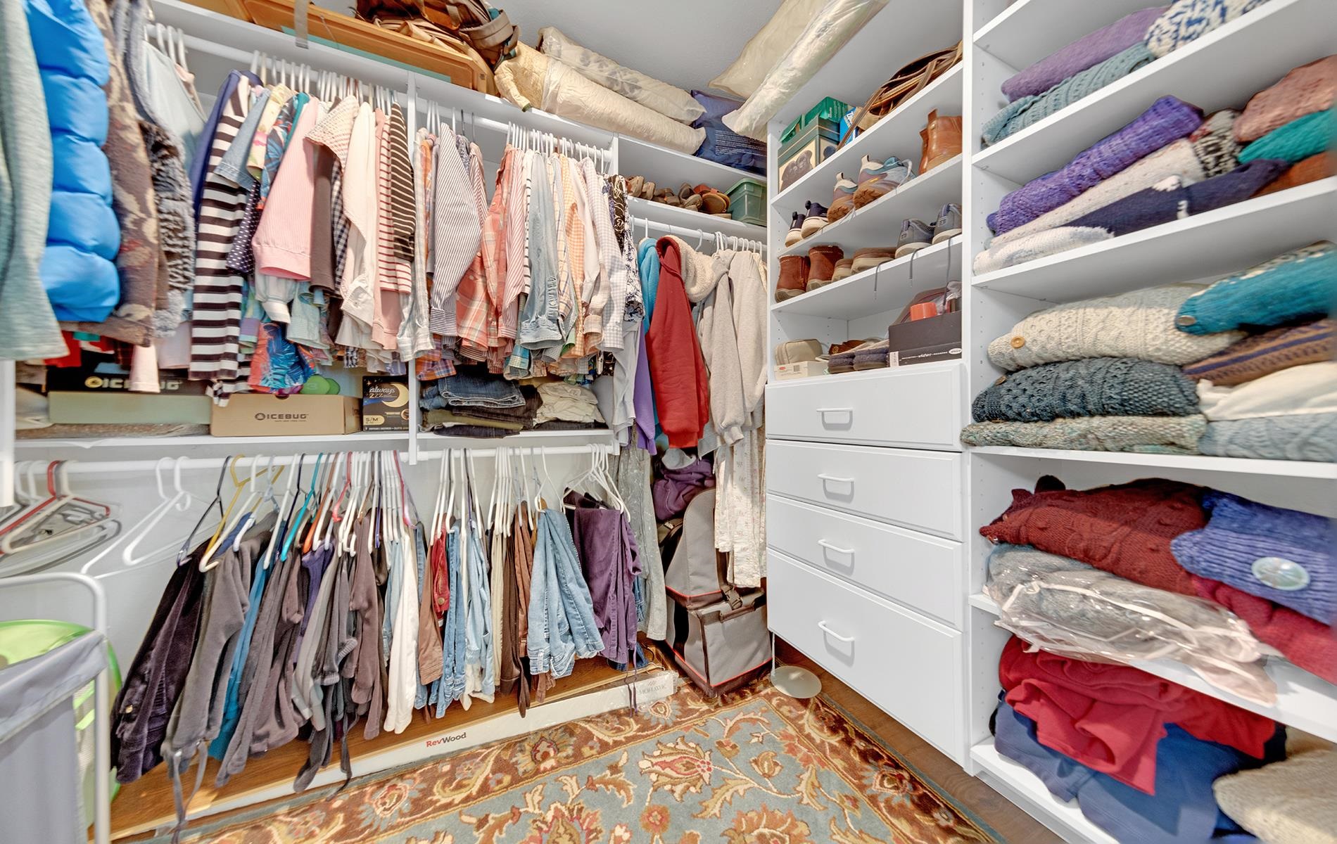 650 Wagon Road Chester, CA 96020 - Photo 14 of 36 a view of walk in closet with clothes and shoes