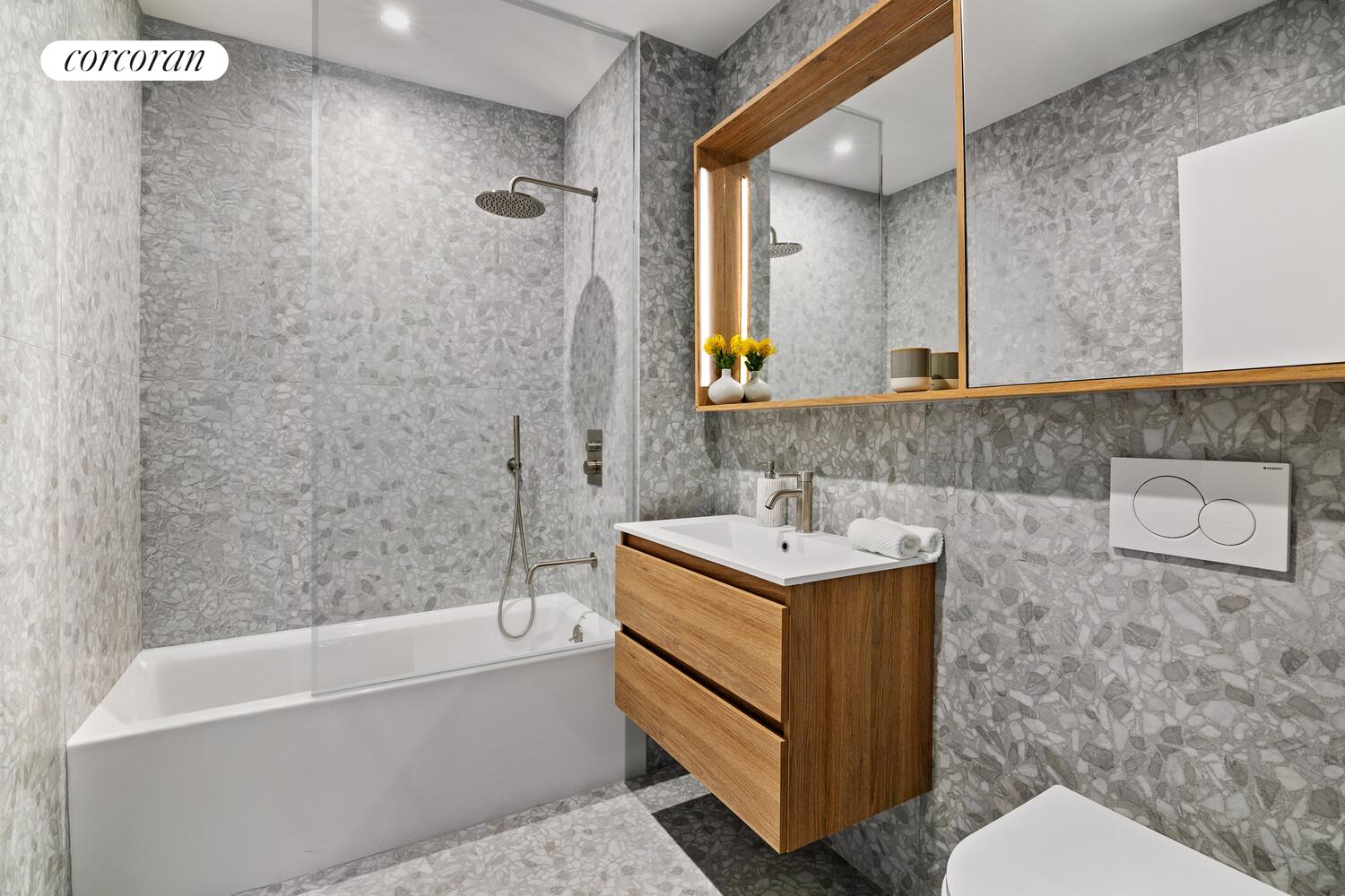 625 New York Avenue, Unit 6B Brooklyn, NY 11203 - Photo 8 of 16 a bathroom with a sink a toilet and bathtub