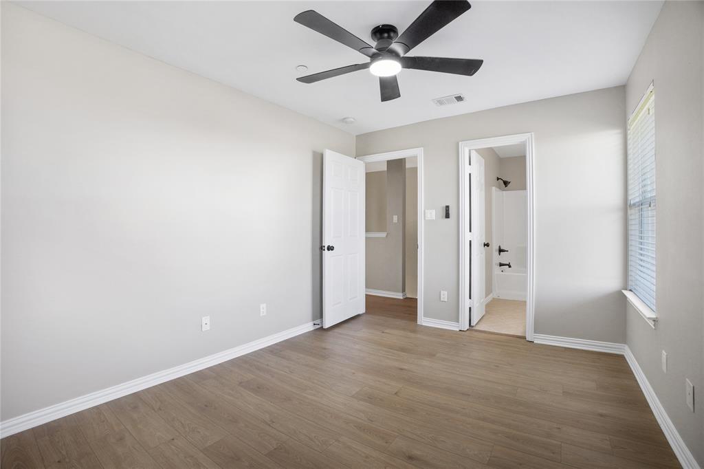2700 Club Ridge Drive, Unit 2 Lewisville, TX 75067 - Photo 22 of 25 wooden floor in an empty room