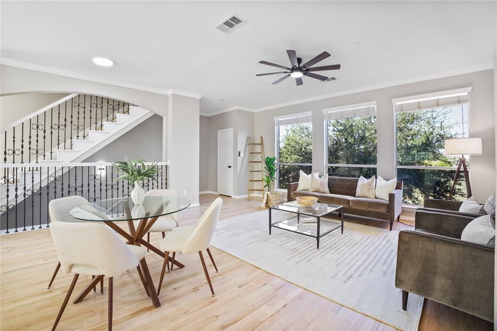 2700 Club Ridge Drive, Unit 2 Lewisville, TX 75067 - Photo 7 of 25 a living room with furniture and a large window