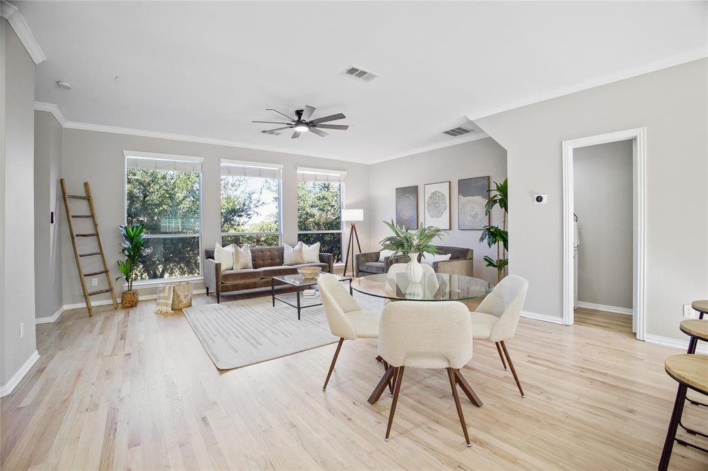 2700 Club Ridge Drive, Unit 2 Lewisville, TX 75067 - Photo 9 of 25 a living room with furniture and a wooden floor