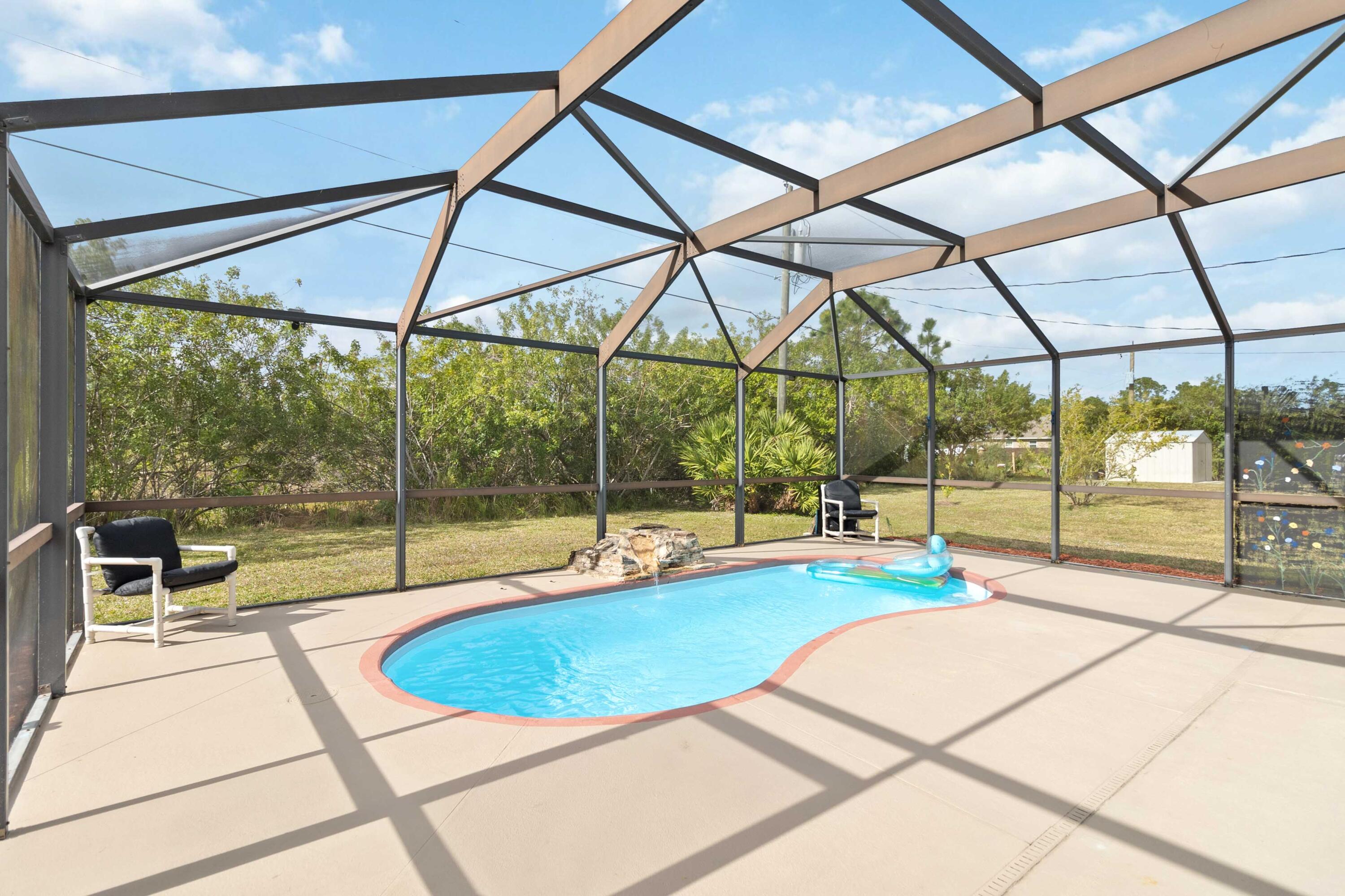 1364 Ran Road Southeast Palm Bay, FL 32909 - Photo 6 of 26 a view of indoor pool and deck