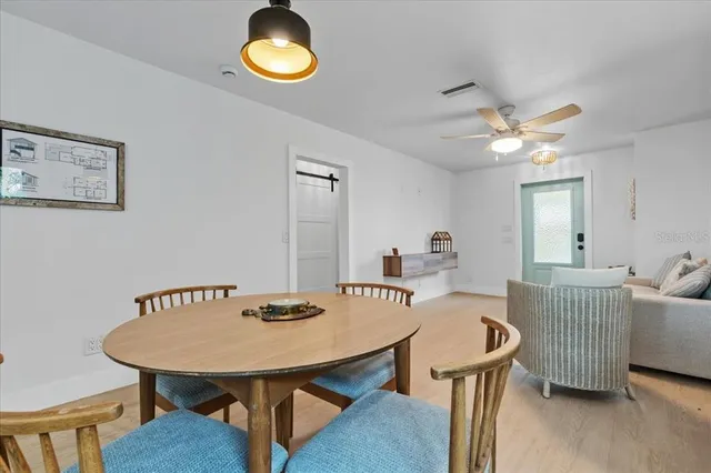 a view of a dining room with furniture