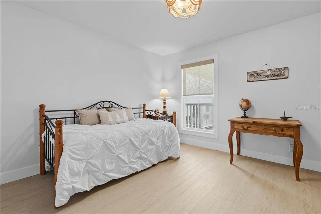 1306 McGregor Street Punta Gorda, FL 33950 - Photo 19 of 29 a bedroom with bed and window