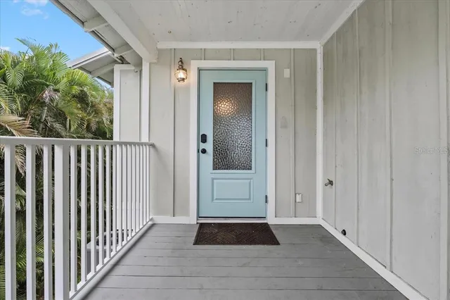 a view of a door and a window