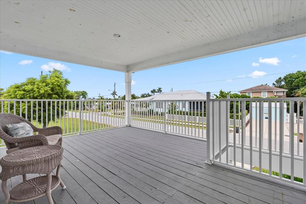 1306 McGregor Street Punta Gorda, FL 33950 - Photo 3 of 29 a view of a balcony with wooden floor