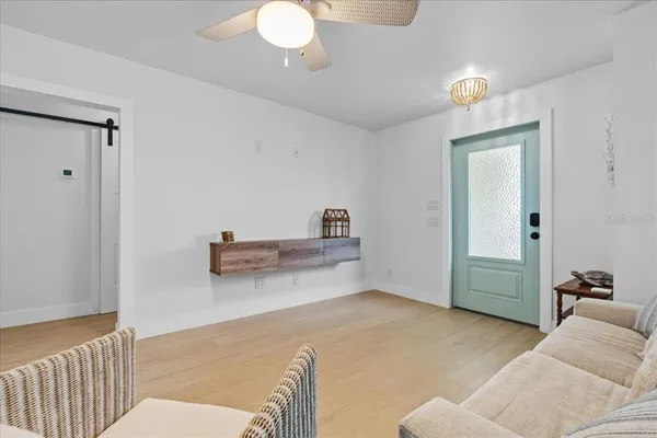 a bedroom with a bed and cabinets