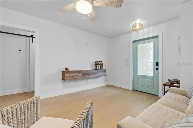 a bedroom with a bed and cabinets