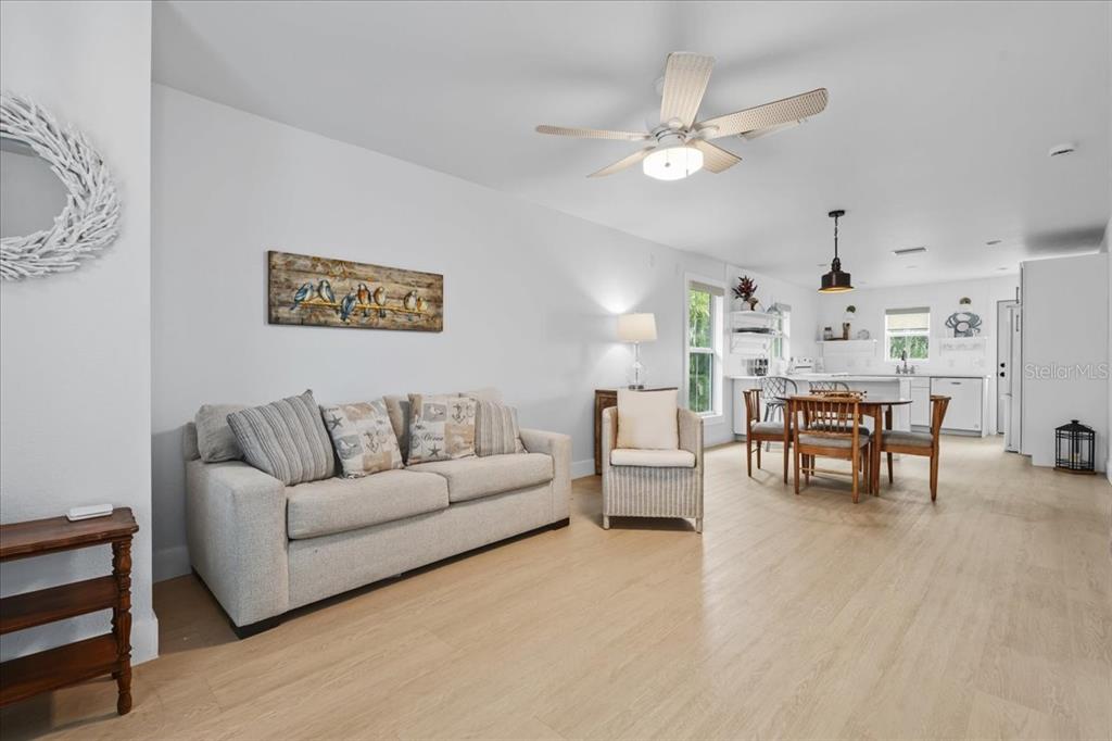1306 McGregor Street Punta Gorda, FL 33950 - Photo 7 of 29 a living room with furniture and kitchen view