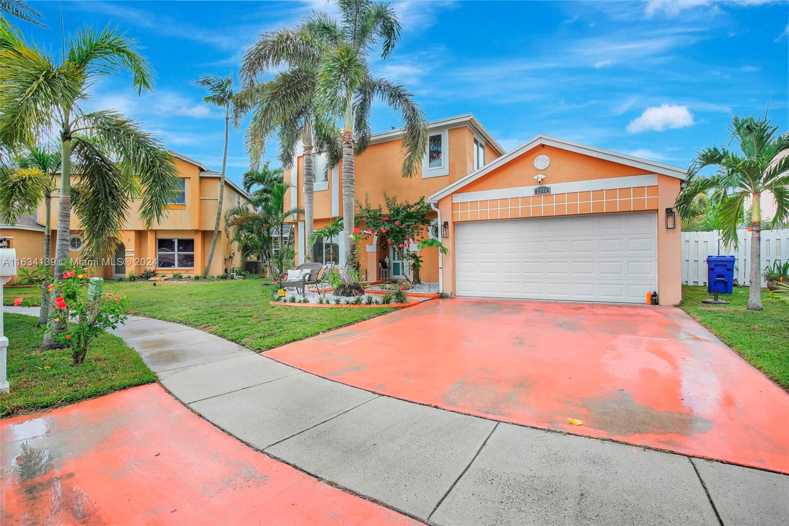2860 Huron Way Miramar, FL 33025 - Photo 1 of 57 a front view of house with yard and trees