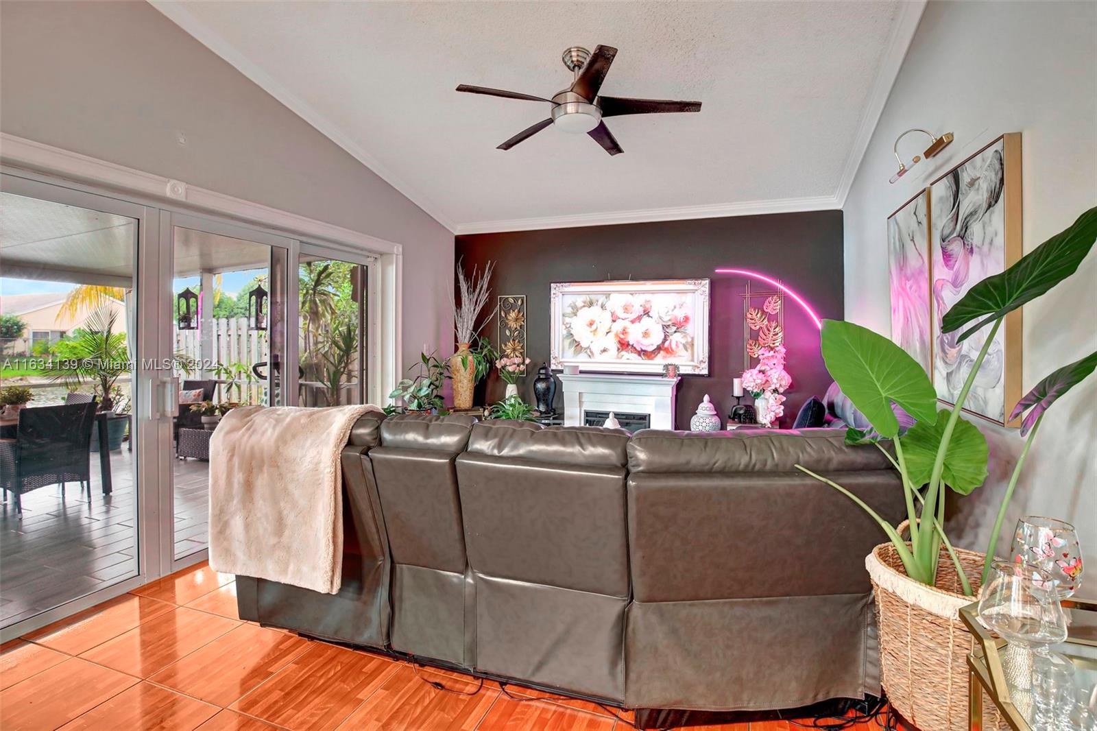 2860 Huron Way Miramar, FL 33025 - Photo 14 of 57 a living room with furniture and a potted plant