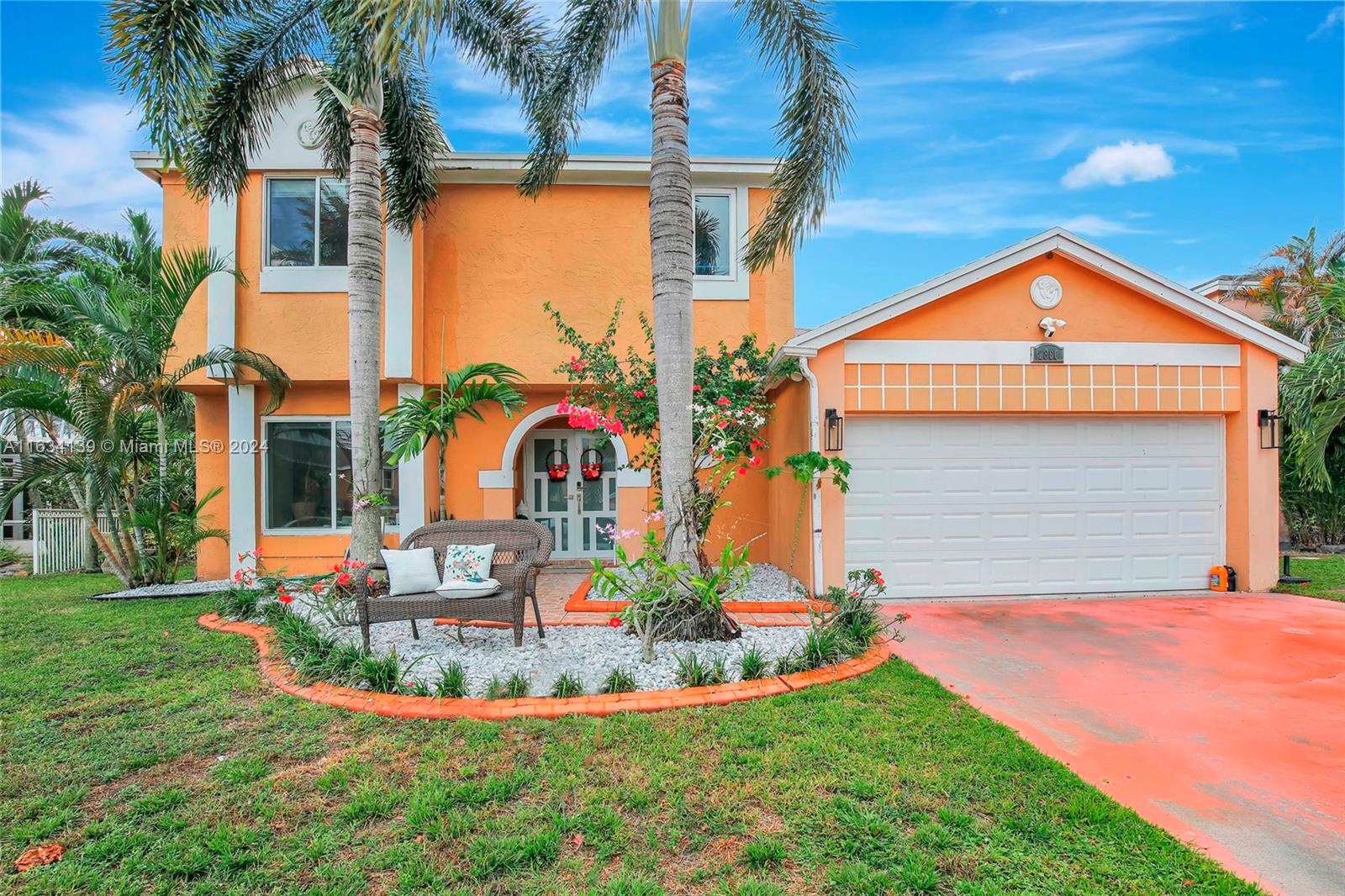 2860 Huron Way Miramar, FL 33025 - Photo 2 of 57 a front view of a house with entertaining space