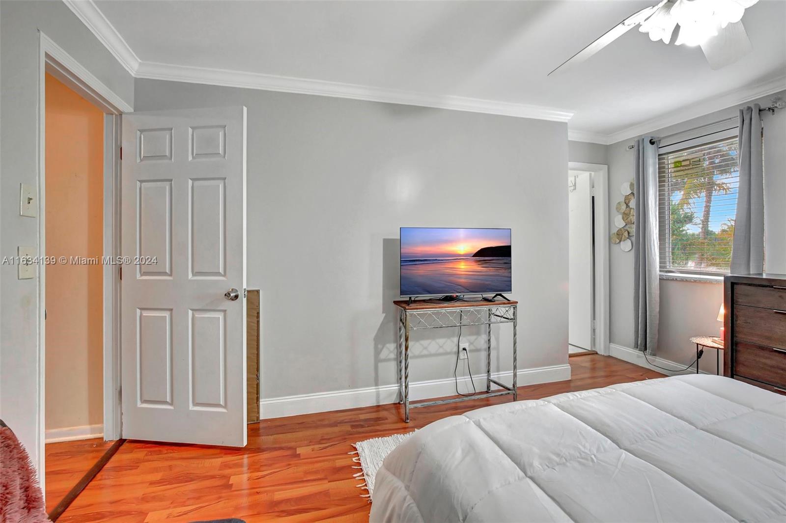 2860 Huron Way Miramar, FL 33025 - Photo 36 of 57 a bedroom with furniture and a flat screen tv