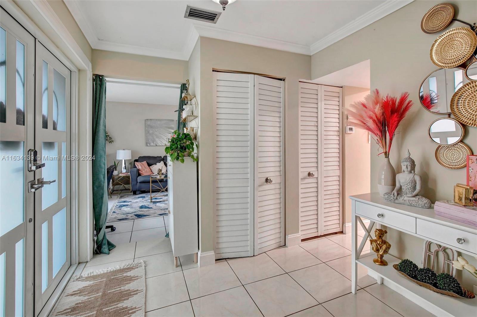 2860 Huron Way Miramar, FL 33025 - Photo 4 of 57 a view of a livingroom with furniture and front door