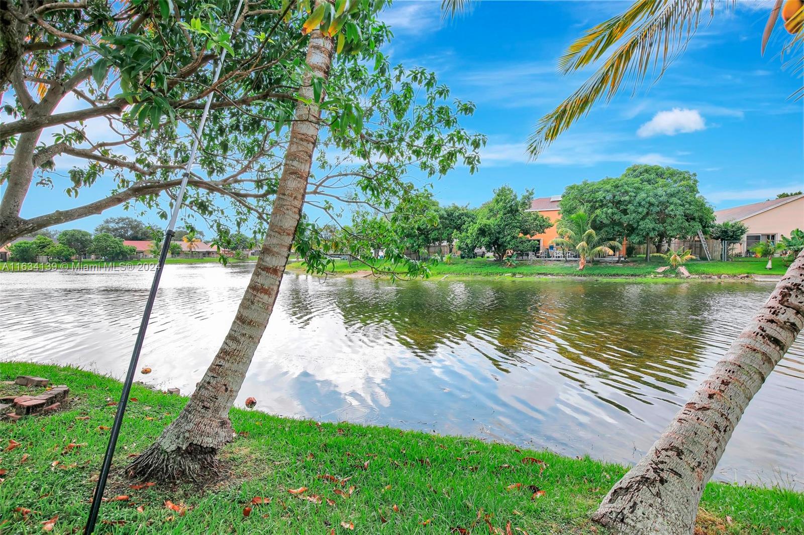 2860 Huron Way Miramar, FL 33025 - Photo 46 of 57 a view of a lake with a yard