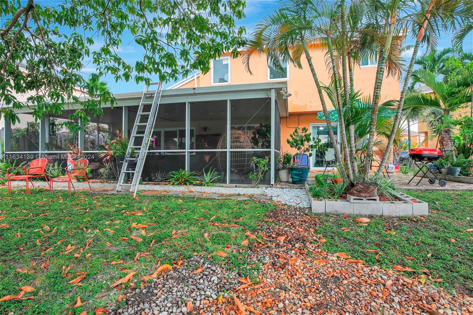 2860 Huron Way Miramar, FL 33025 - Photo 48 of 57 a front view of house with yard and green space