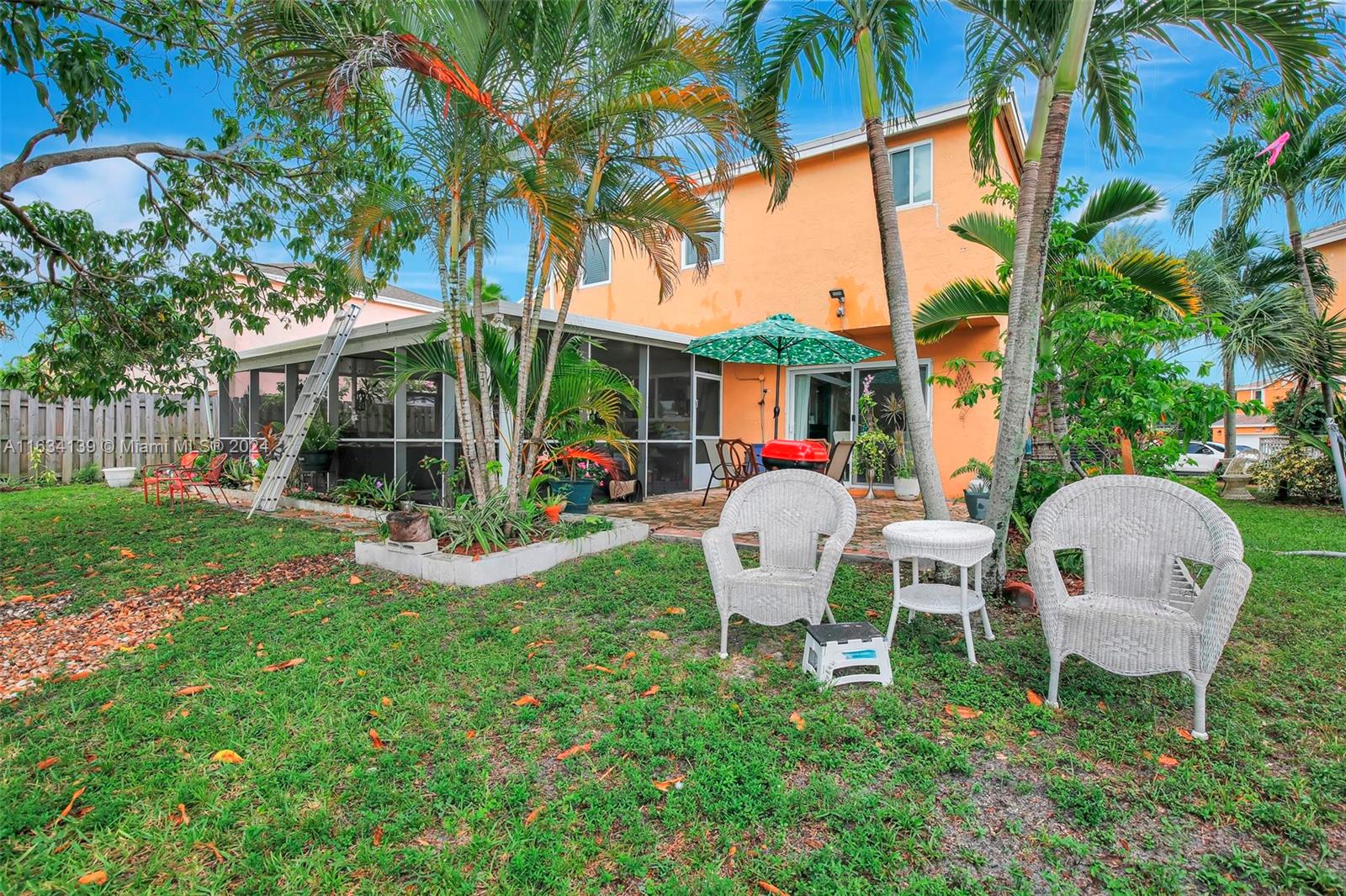 2860 Huron Way Miramar, FL 33025 - Photo 49 of 57 a view of house with backyard and outdoor seating