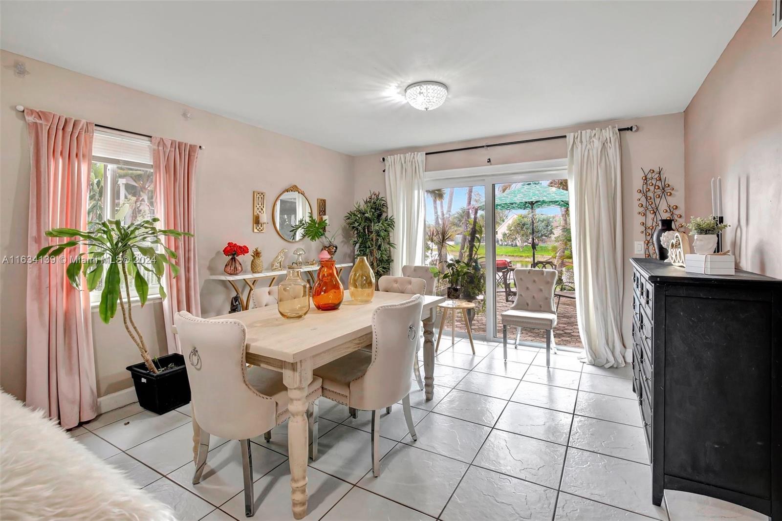 2860 Huron Way Miramar, FL 33025 - Photo 8 of 57 a view of a dining room with furniture and a window