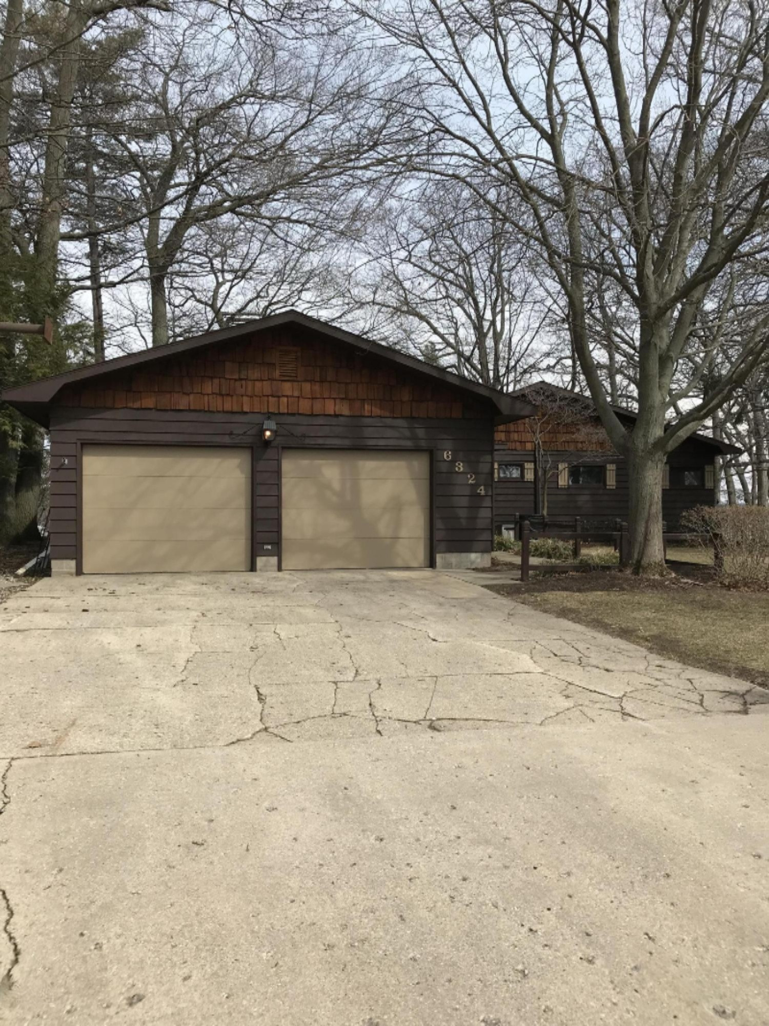 6324 Indian Point Road Montague, MI 49437 - Photo 8 of 48 Front of house with garage - Copy (2)