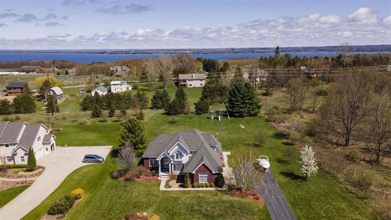 7284 Westwind Road Traverse City, MI 49686 - Photo 2 of 44 1887064-1.JPG