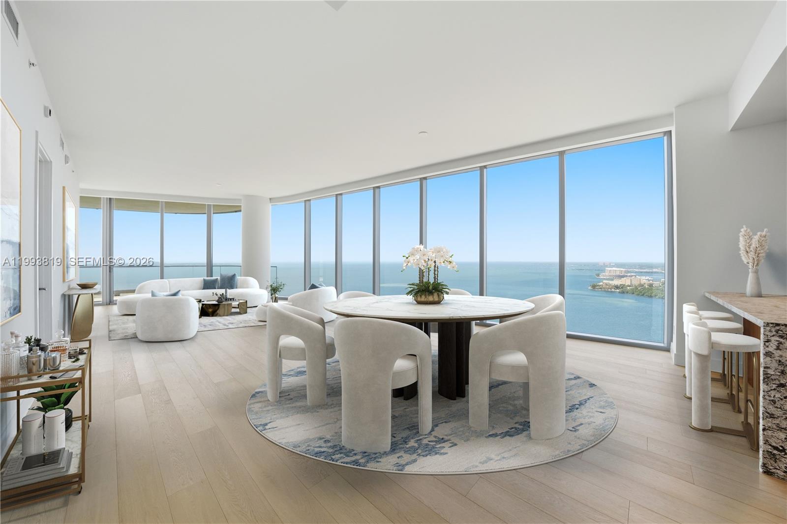 175 Southeast 25th Road, Unit 3102 Miami, FL 33129 - Photo 5 of 65 a living room with furniture a fireplace and a table