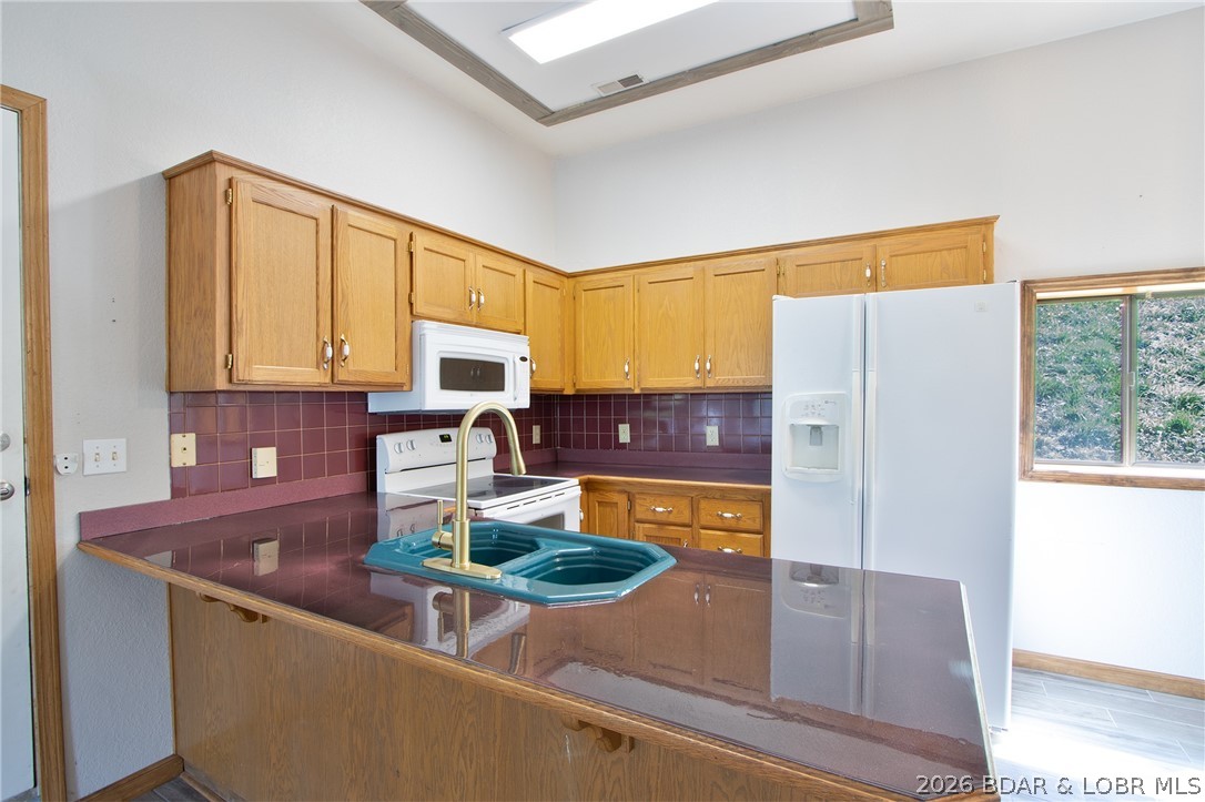 66 Spg Hl Road Sunrise Beach, MO 65079 - Photo 7 of 38 kitchen