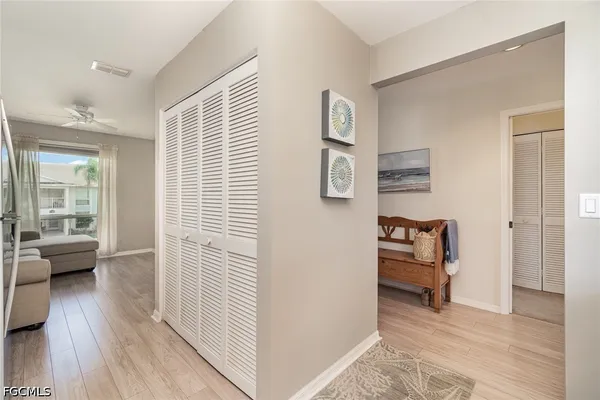 a view of a livingroom with furniture and wooden floor