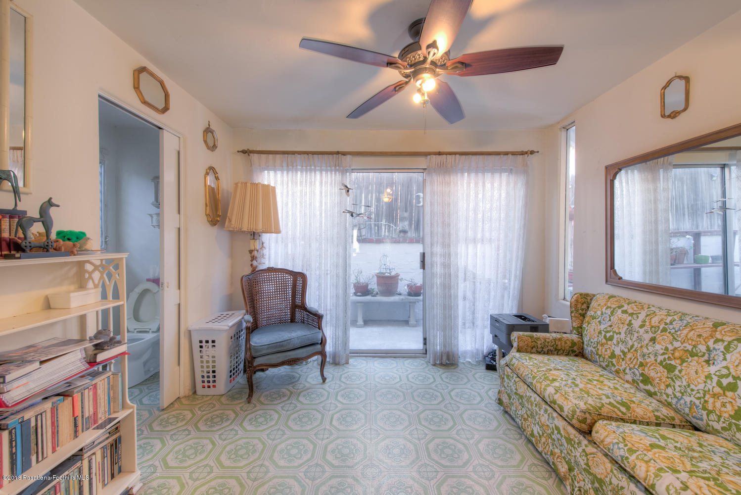 1900 Montecito Drive Glendale, CA 91208 - Photo 11 of 30 a living room with furniture and a flat screen tv