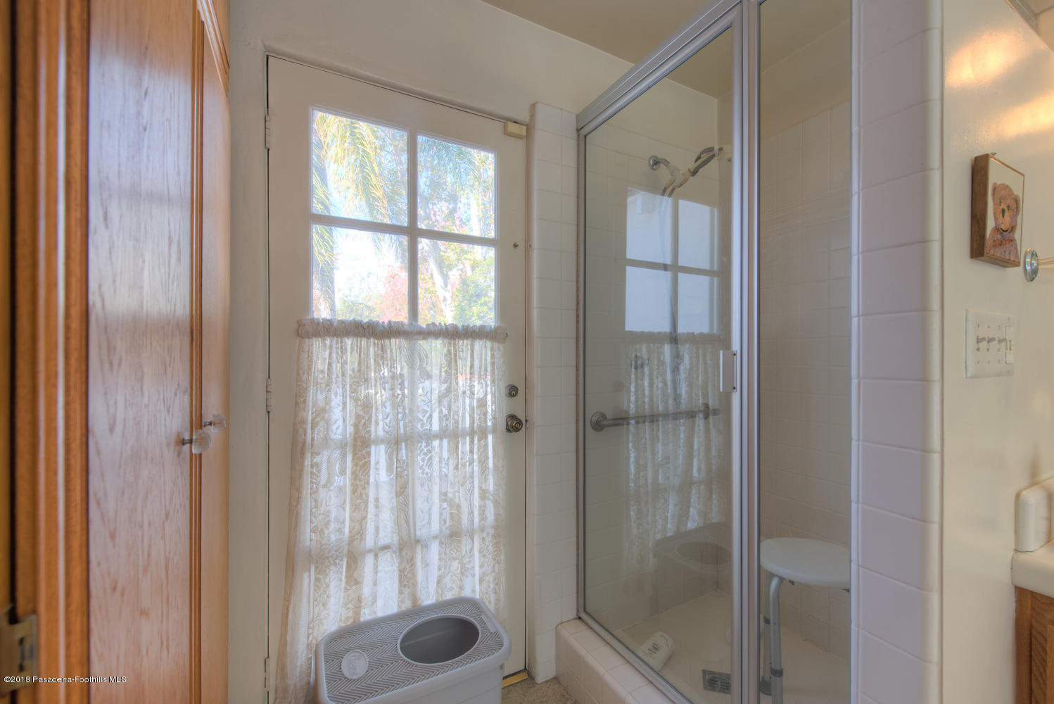 1900 Montecito Drive Glendale, CA 91208 - Photo 22 of 30 a bathroom with a glass shower door
