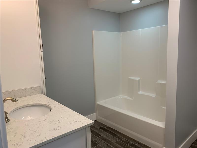 2245 Ridge Drive Mars, PA 16046 - Photo 14 of 15 Full bath on Lower Level with ceramic tile floor.