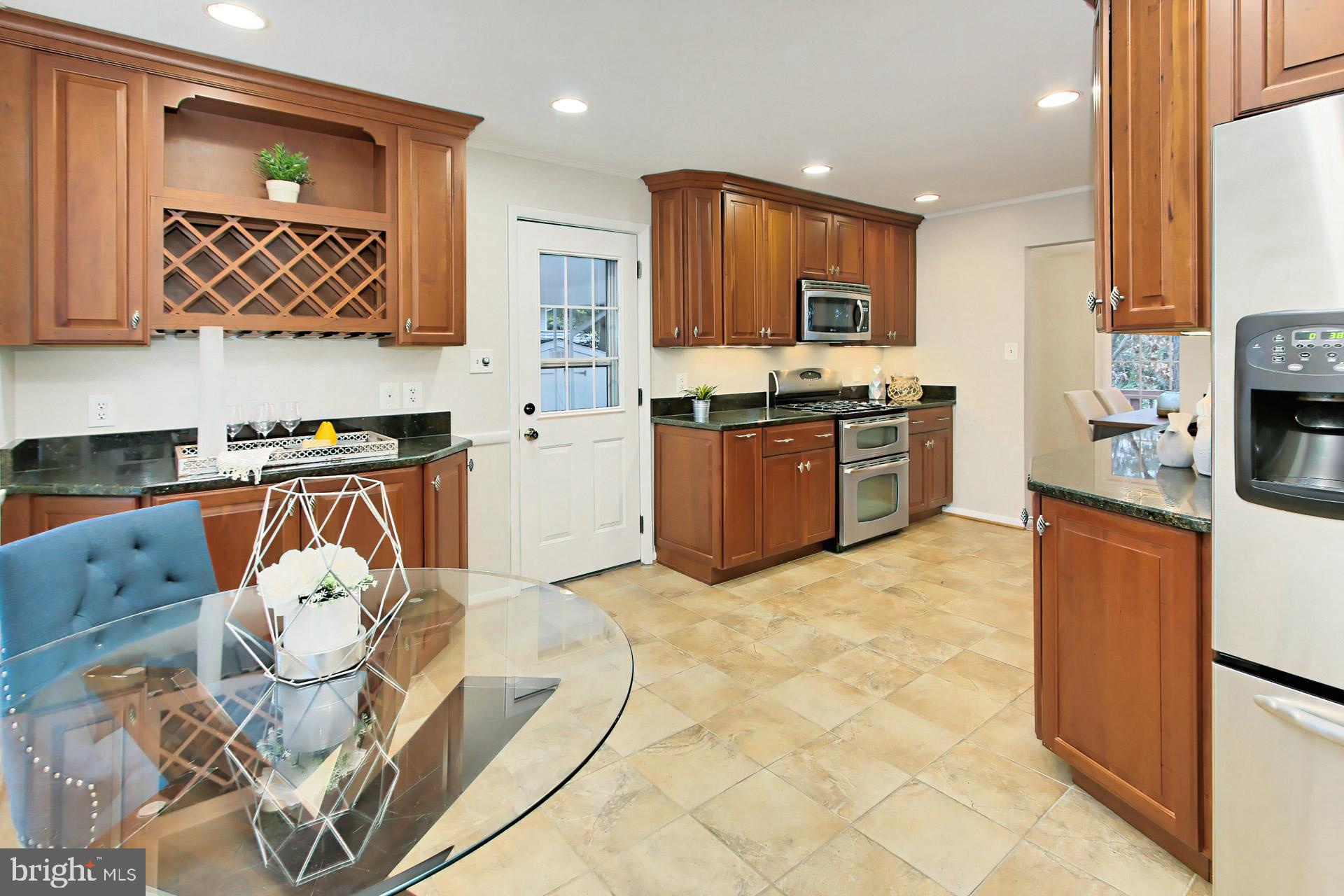 6313 Alberta Street Springfield, VA 22152 - Photo 16 of 45 Extra cabinets and wine bottle rack
