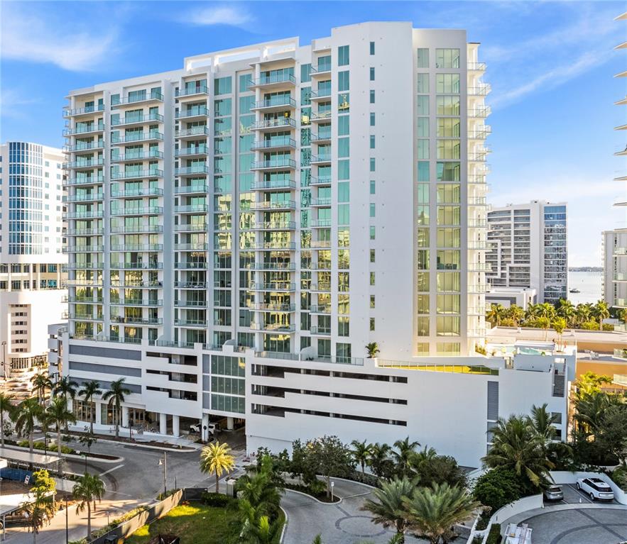 301 Quay Commons, Unit 1204 Sarasota, FL 34236 - Photo 1 of 1 a view of a tall building