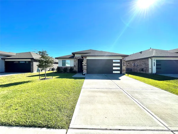 a view of a swimming pool with an outdoor space and seating area