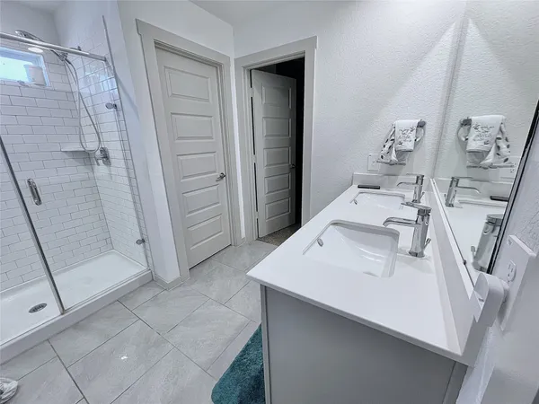 a workspace with furniture and shower