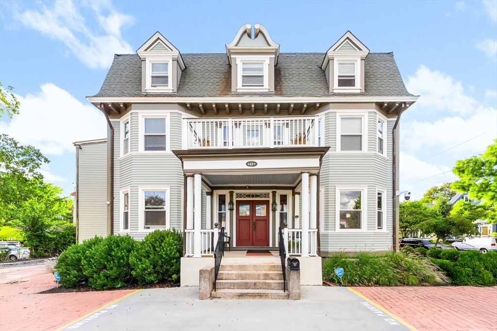 a front view of a multi story residential apartment building