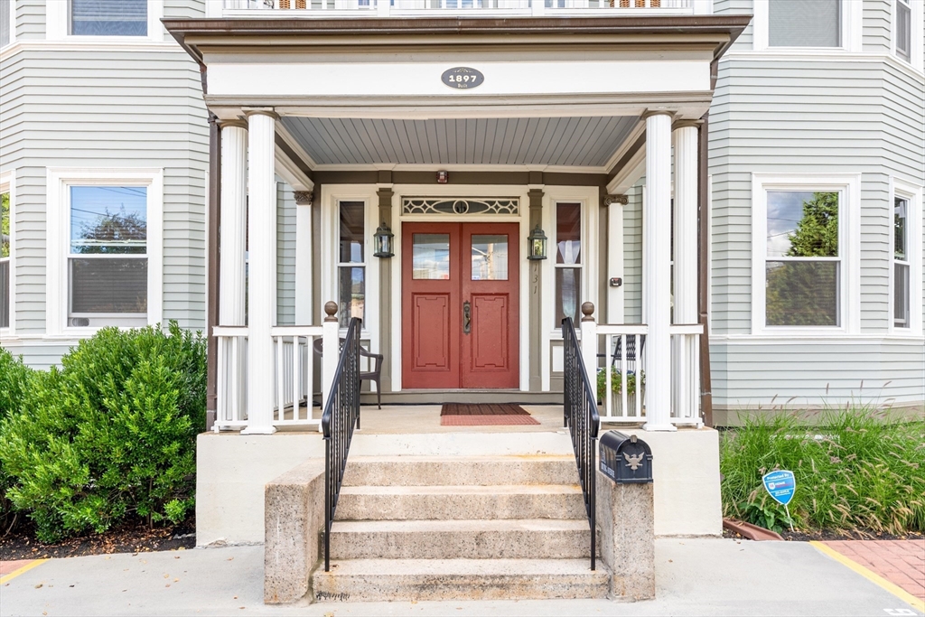 131 Irving Avenue, Unit 3 Providence, RI 02906 - Photo 2 of 14 a front view of a house with a outdoor shower