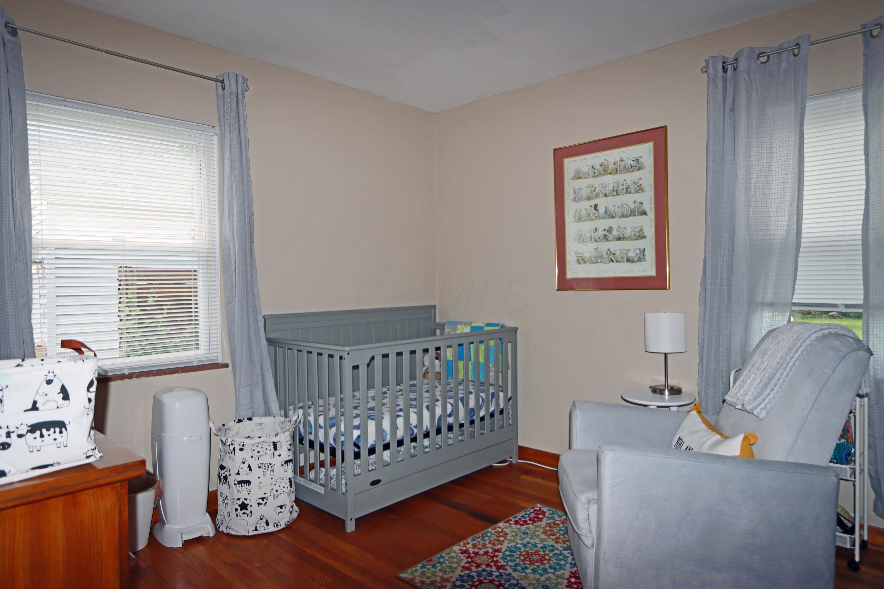 2717 Tudor Road Columbus, OH 43209 - Photo 23 of 51 Main level Bedroom 2, hardwood floor