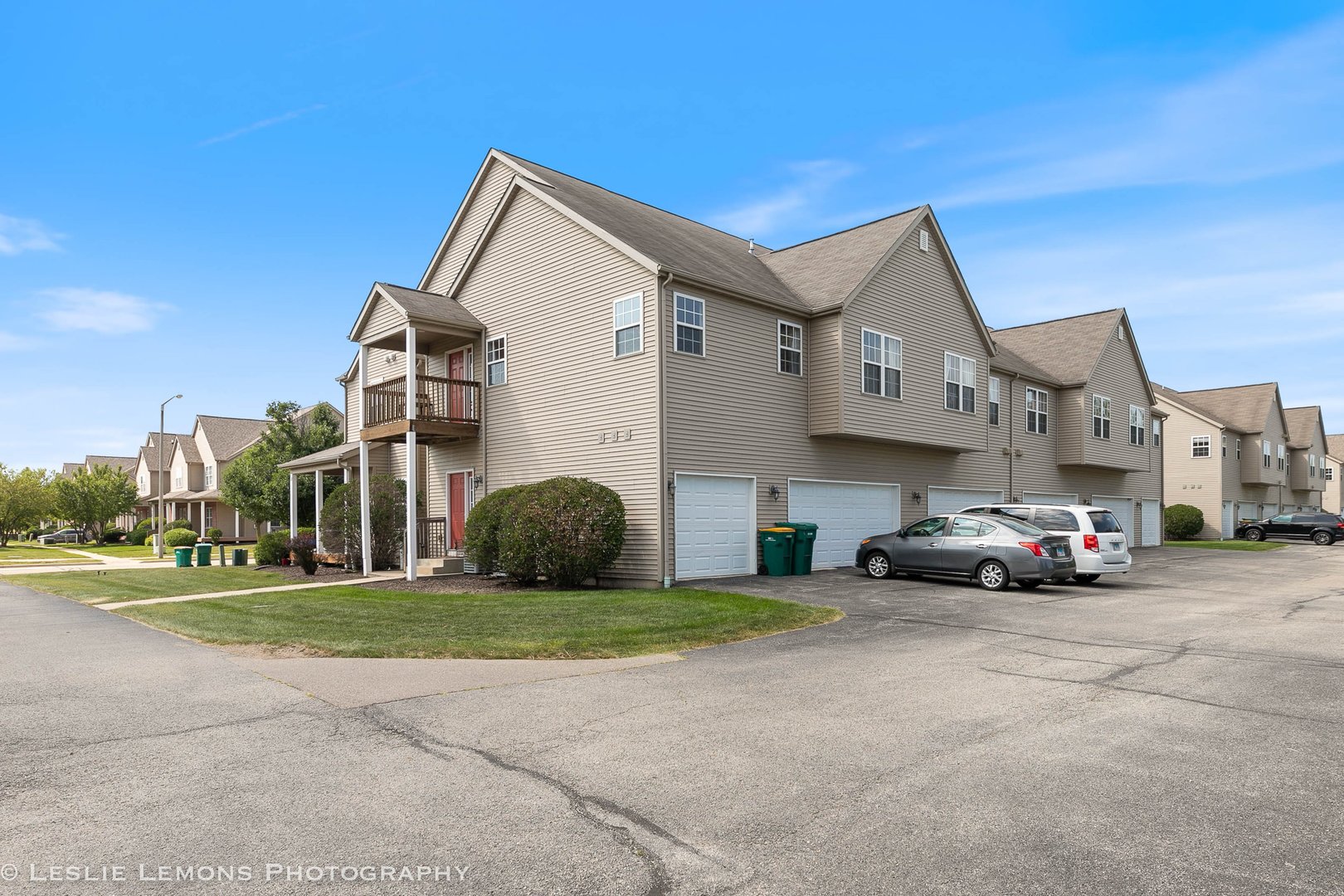 581 Stonegate Drive Sycamore, IL 60178 - Photo 2 of 23 a view of a car parked in front of a brick house