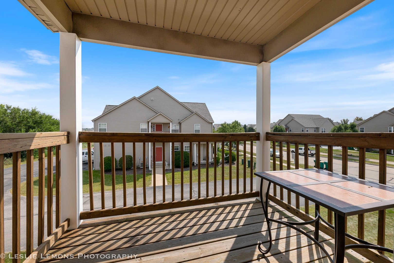 581 Stonegate Drive Sycamore, IL 60178 - Photo 4 of 23 a view of a balcony with wooden floor
