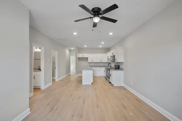a view of a kitchen and a sink