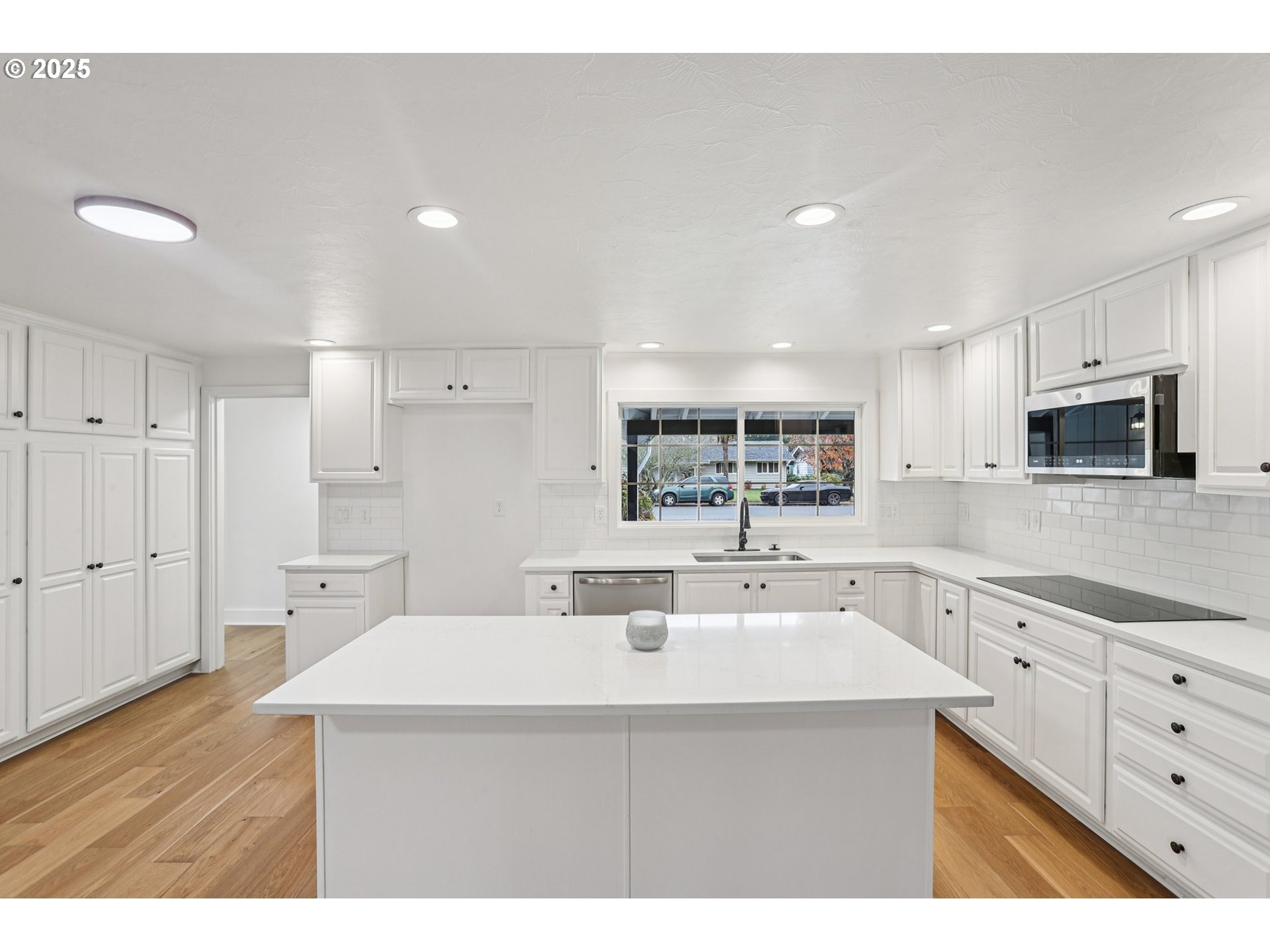 870 Rafael Avenue North Keizer, OR 97303 - Photo 13 of 37 a kitchen with sink a microwave and cabinets