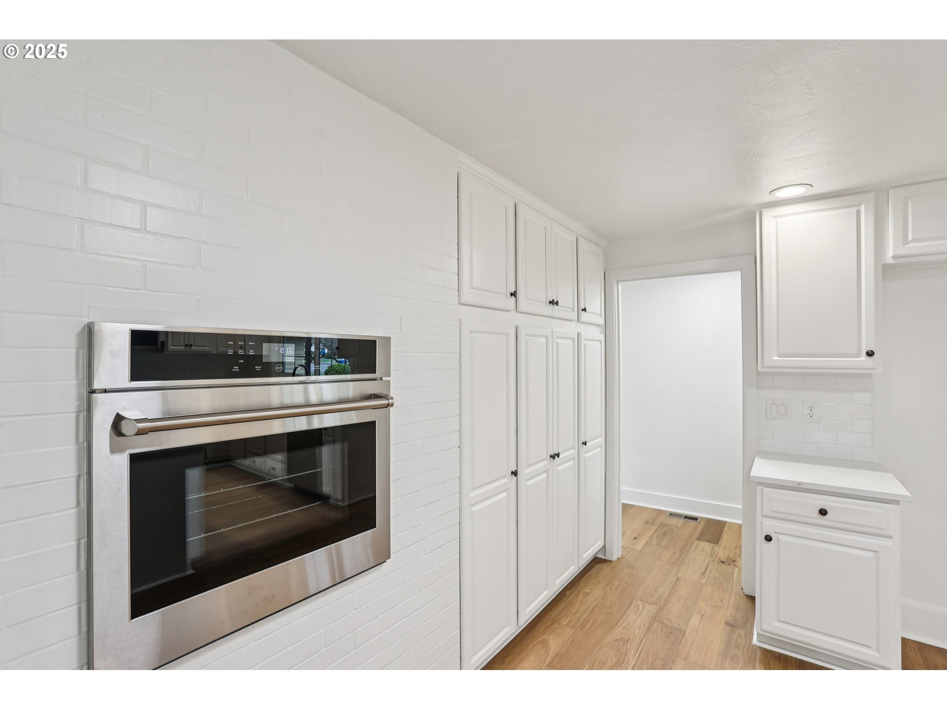 870 Rafael Avenue North Keizer, OR 97303 - Photo 18 of 37 a view of a hallway with stainless steel appliances