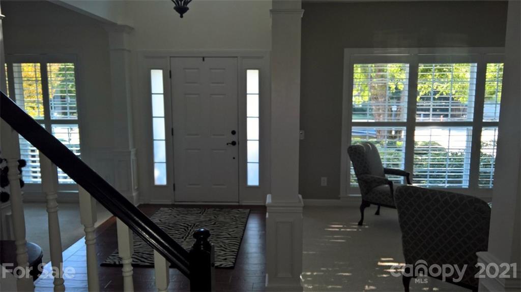 311 Matthews Estates Road Matthews, NC 28105 - Photo 2 of 27 a view of a workspace with furniture and a window