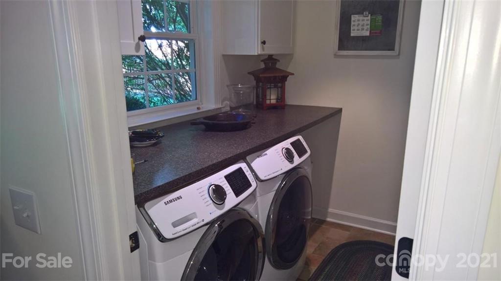 311 Matthews Estates Road Matthews, NC 28105 - Photo 14 of 27 a utility room with dryer and washer