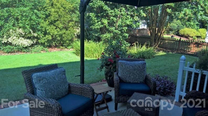 311 Matthews Estates Road Matthews, NC 28105 - Photo 27 of 27 a outdoor living space with furniture and garden