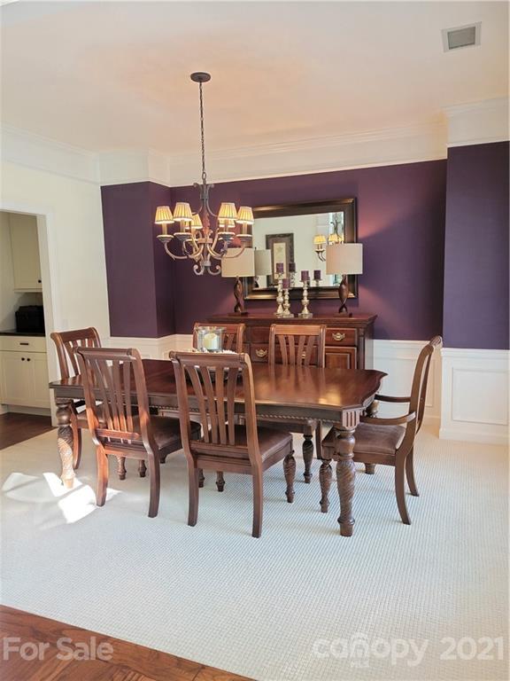 311 Matthews Estates Road Matthews, NC 28105 - Photo 5 of 27 a dining room with furniture and window