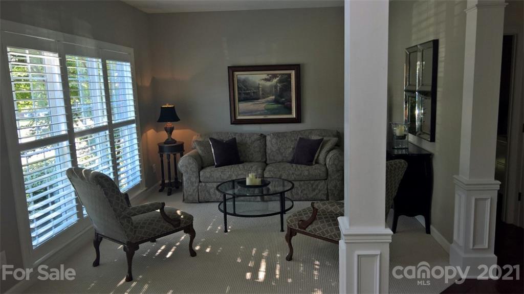 311 Matthews Estates Road Matthews, NC 28105 - Photo 6 of 27 a living room with furniture and a window