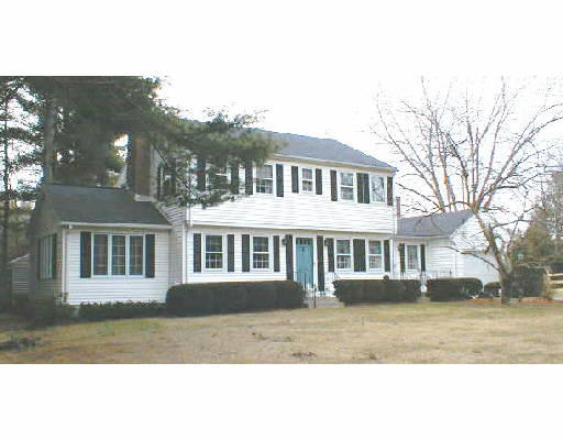 1026 Tinkham Road Wilbraham, MA 01095 - Photo 1 of 1 a front view of a house with a garden