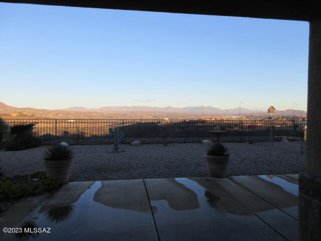 511 Camino Hombre De Oro Rio Rico, AZ 85648 - Photo 16 of 44 a view of roof view with sitting space and garden view